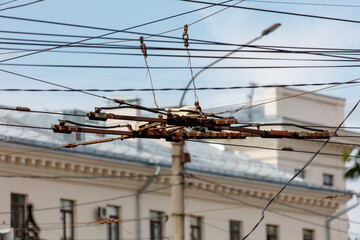 A power line is hanging from a pole
