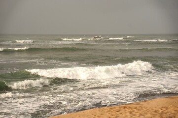 waves breaking on the beach