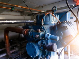 Compressor block with hose fitting for pressure measurement gauge.