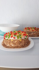 Two brightly decorated cakes