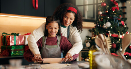 Christmas, baking and rolling pin with family in kitchen of home together for festive tradition....