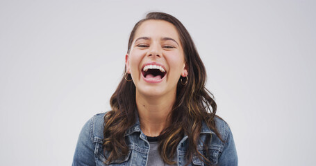 Portrait, laugh and woman in studio for crazy emotion, joke and silly on white background space....