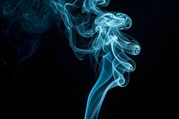 Abstract teal smoke swirls against a dark black background