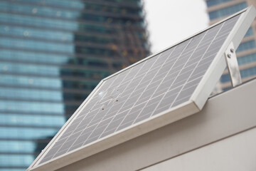 Solar panel installation on a modern building rooftop