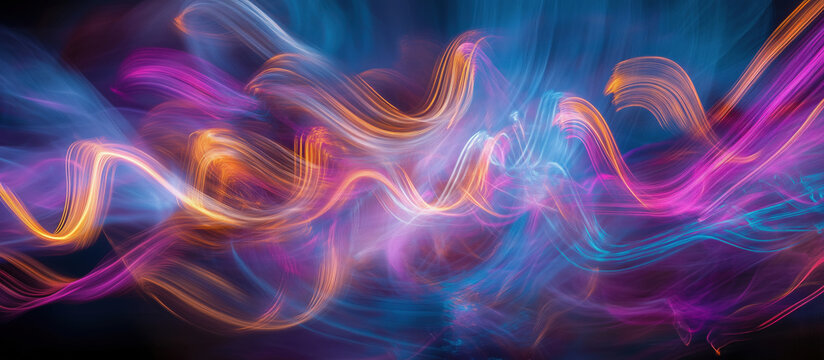 Colorful abstract light trails creating dynamic wave patterns in vibrant hues.
