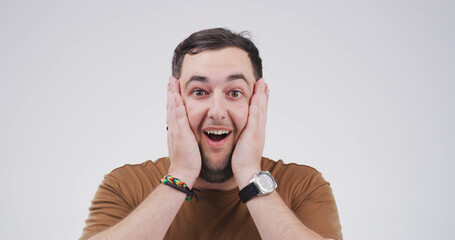 Shocked, man and reaction to rumor, portrait or amazed by announcement, gossip and white...
