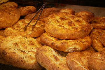 Freshly baked bread displayed in a bakery setting