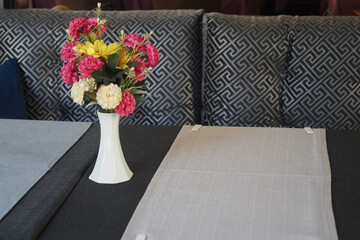 Elegant table setting with flowers and stylish decor