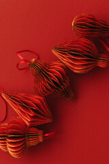 Shining Christmas Ornaments of Red Paper, winter seasonal holiday decorations as flashlight or...