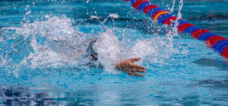 Swimming in the 100 backstroke