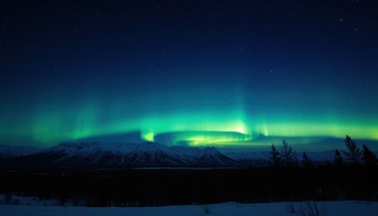 Captivating Aurora Borealis Over Snowy Mountains at Night with Stunning Sky