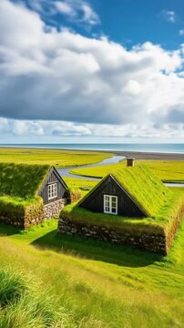 Traditional icelandic turf houses blend into the green landscape under a cloudy sky, showcasing rural architecture