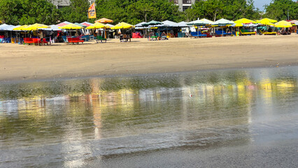 Beach holiday scene at Legian Beach in Bali