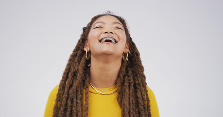 Studio, laughing and woman with humor, happy and listening to funny joke, white background or...