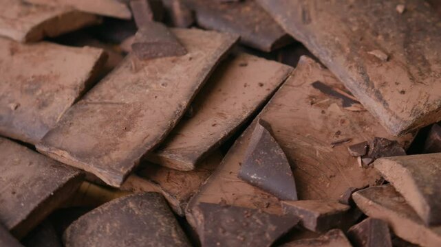 Chunk of cacoa mass bar or cocoa liquor. 100% pure cocoa chocolate.