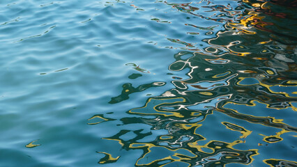 sky blue water surface with ripples