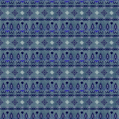 Seamless ethnic tribal monochromatic striped pattern. Gray, blue ornament.