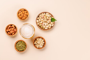 A vibrant assortment of various nuts and beer