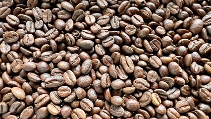 Close up roasted coffee beans can be used as a background