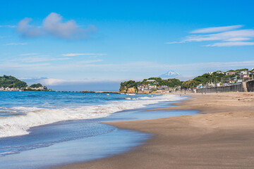 Beautiful scenery of Kamakura Beach in Japan with Mount Fuji in the background, located in Kanagawa Prefecture, Japan.