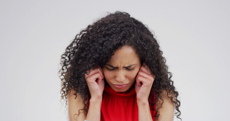 Emotional, woman and crying with grief in studio for bad news, mourning loss and breakdown. Female...