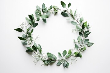 Naklejka premium Ethereal greenery wreath Delicate floral arrangement natural elegance flat lay on white background. Generative Ai