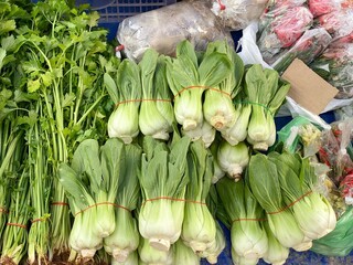 Fresh vegetables for sale at a street market background. Stock photo.