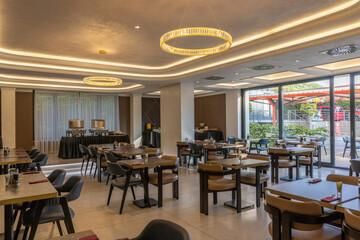 Stylish modern restaurant interior with cozy seating