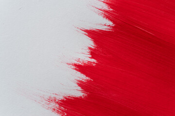 赤色の絵具の模様	