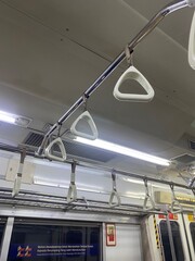 Jakarta, June 20, 2025. The area inside the train with the background of the carriage and handrails on the carriage.