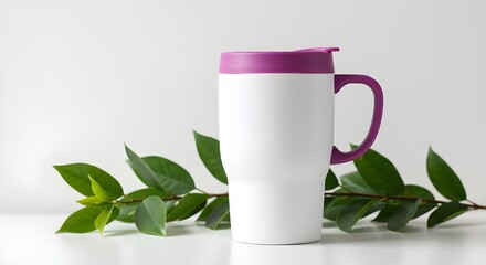 White Travel Mug with Purple Handle and Green Branch on Clean White Background