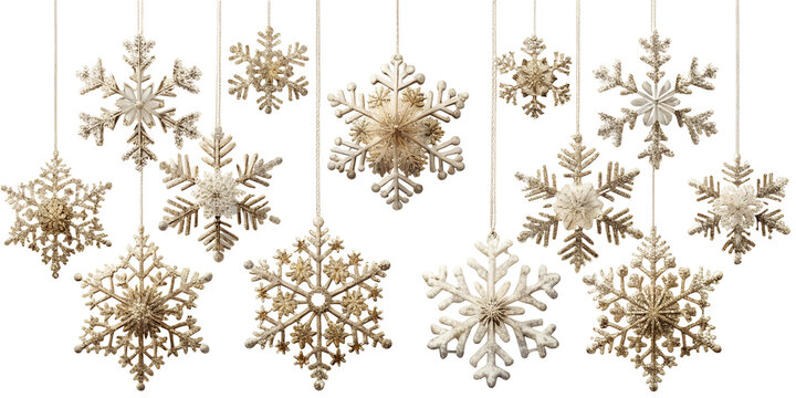 Elegant gold snowflakes hanging as christmas ornaments isolated on transparent background