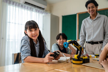 Portrait of Asian students learning in classroom at elementary school. 