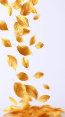 Fototapeta premium Golden autumn leaves falling from a tree against a bright sky with soft sunlight creating a serene seasonal landscape scene