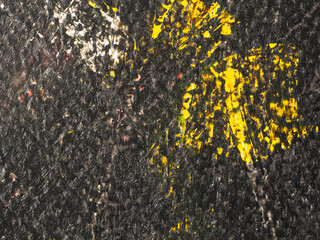 Colorful abstract design featuring bold yellow and dark textures creating a unique visual contrast in a modern art installation