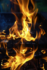 Intense Fire Flames Over Wood Logs: High-Resolution Stock Photo for Campfire, Bonfire, and Firepit...