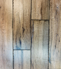 Rustic wood texture background with weathered planks, showing distressed grain and unique wavy...