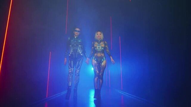 Two women walks studio full smoke, Fantasy cyborg woman robot costume metal body cyberpunk style hair dark shadow silhouette. Sexy alien girl in virtual reality game lady warrior future. neon light 4k