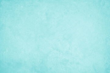 Pastel blue and white concrete stone texture for background in summer wallpaper. Cement and sand wall of tone vintage. Concrete abstract wall of light cyan color, cement texture mint green for design.