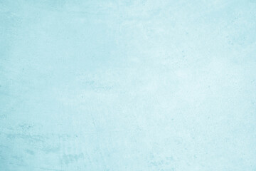 Pastel blue and white concrete stone texture for background in summer wallpaper. Cement and sand wall of tone vintage. Concrete abstract wall of light cyan color, cement texture mint green for design.