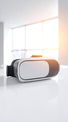 VR headset on a white surface, bright window