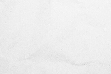 White recycled craft paper texture as background. Grey paper texture, Old vintage page or grunge vignette of old newspaper. Pattern rough art creased grunge letter. Hardboard with copy space for text.