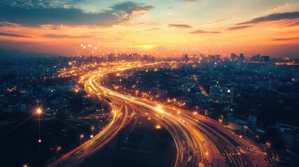 Aerial View of Busy Urban Highway at Dusk with Lights and Sunset Over City Skyline Creating a Dynamic Cityscape Atmosphere
