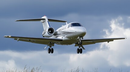 Elegant Private Jet Approaching Landing Against Dramatic Sky with Clouds and Soft Light in Background Perfect for Aviation and Luxury Themes