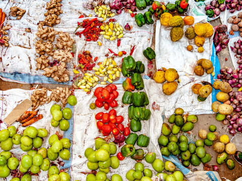 vegetables and fruits offered by local people at the farmers market in Stone Town at the island of Zansibar,