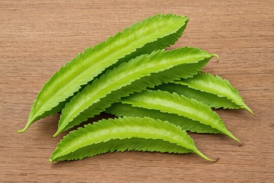 Winged Bean displayed on rustic wooden surface