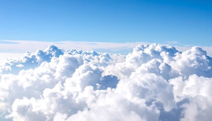 Aerial view of cumulus clouds against a vibrant blue sky