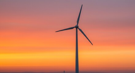Obraz premium A silhouette of a wind turbine against a vibrant, colorful sunset sky.