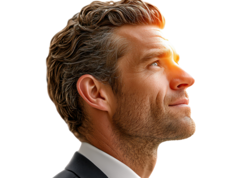 Visionary: A captivating close-up showcases a man gazing upward with an expression of focused contemplation, bathed in a warm, illuminating light