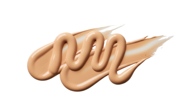 Beige foundation smears and drops on a white surface forming abstract shapes